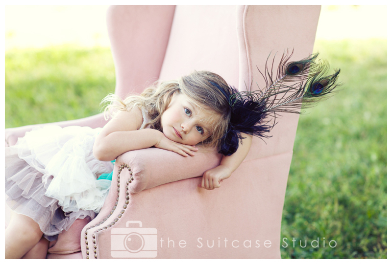 Stylized Childrens Portrait in Pink Chair in Field by The Suitcase Studio