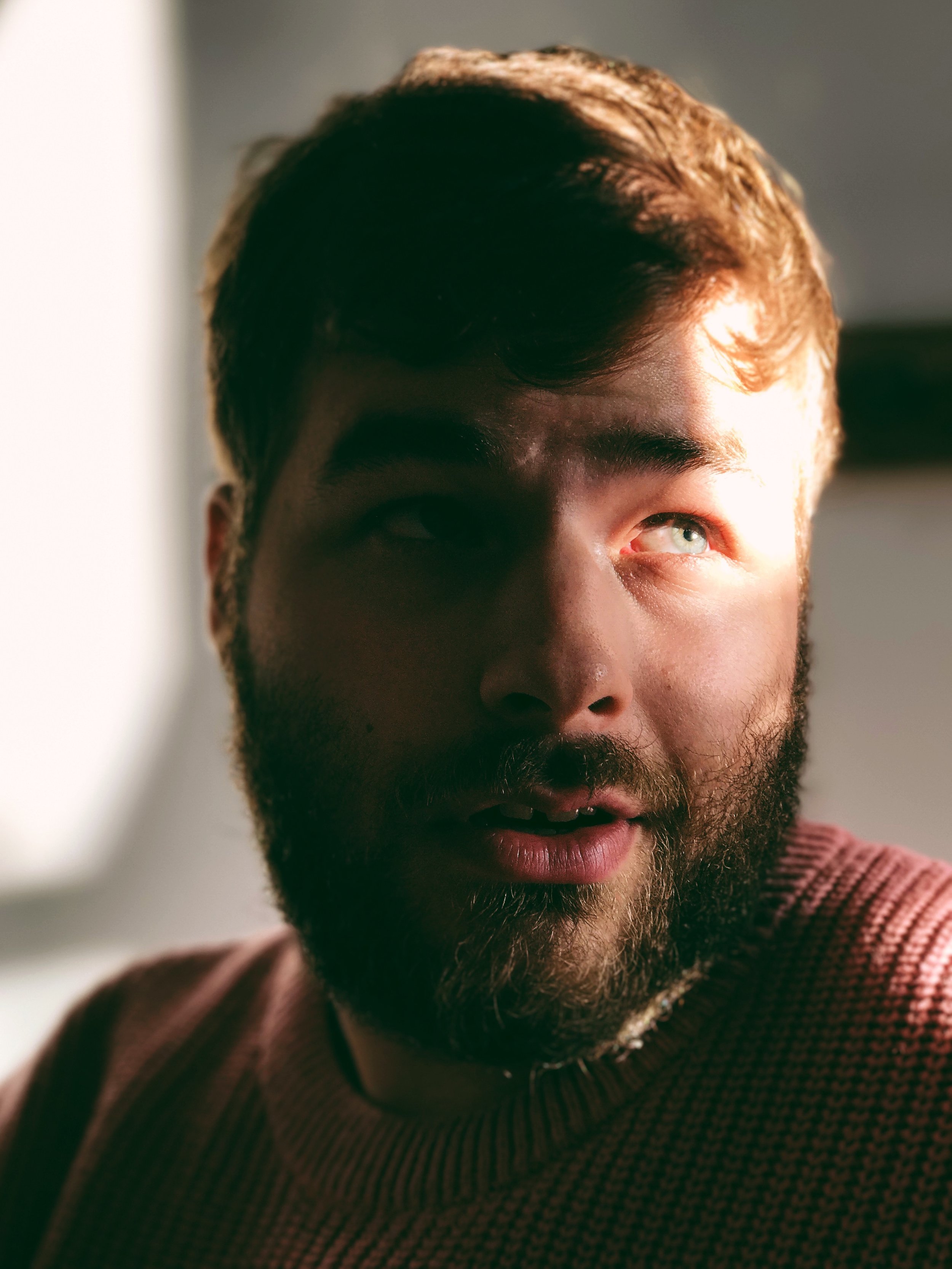 Indoor portrait of my boyfriend with available indoor light. Exposure 1/60 at f/2.8. Edited with VSCO.