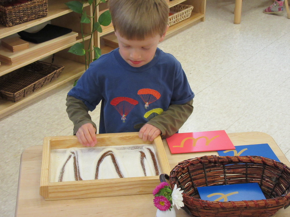 More tactile work with individual letters, focusing on each sound