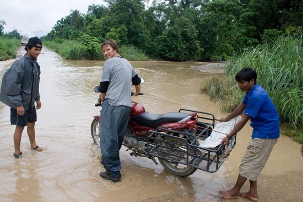 Yours truly tryuing to get the motorcycle across a monsoon flooded road