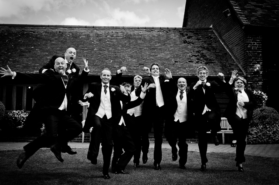 Not the most masculine jump at Cooling Castle wedding