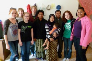 Eastern Mennonite University students visit a Karen refugee family.