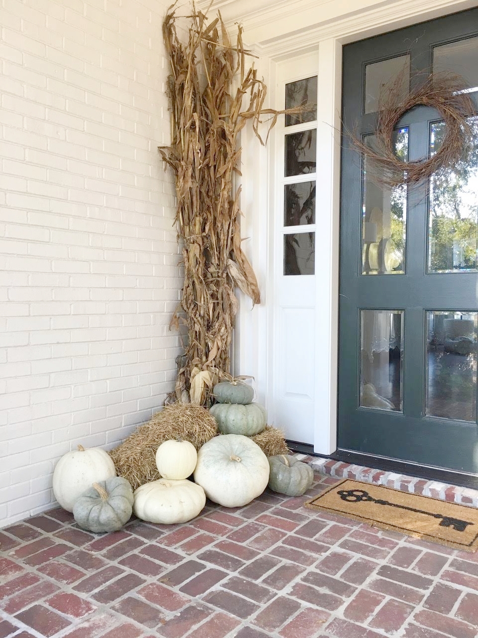  Fall Front Porch Decorations with green, gray and white pumpkins 