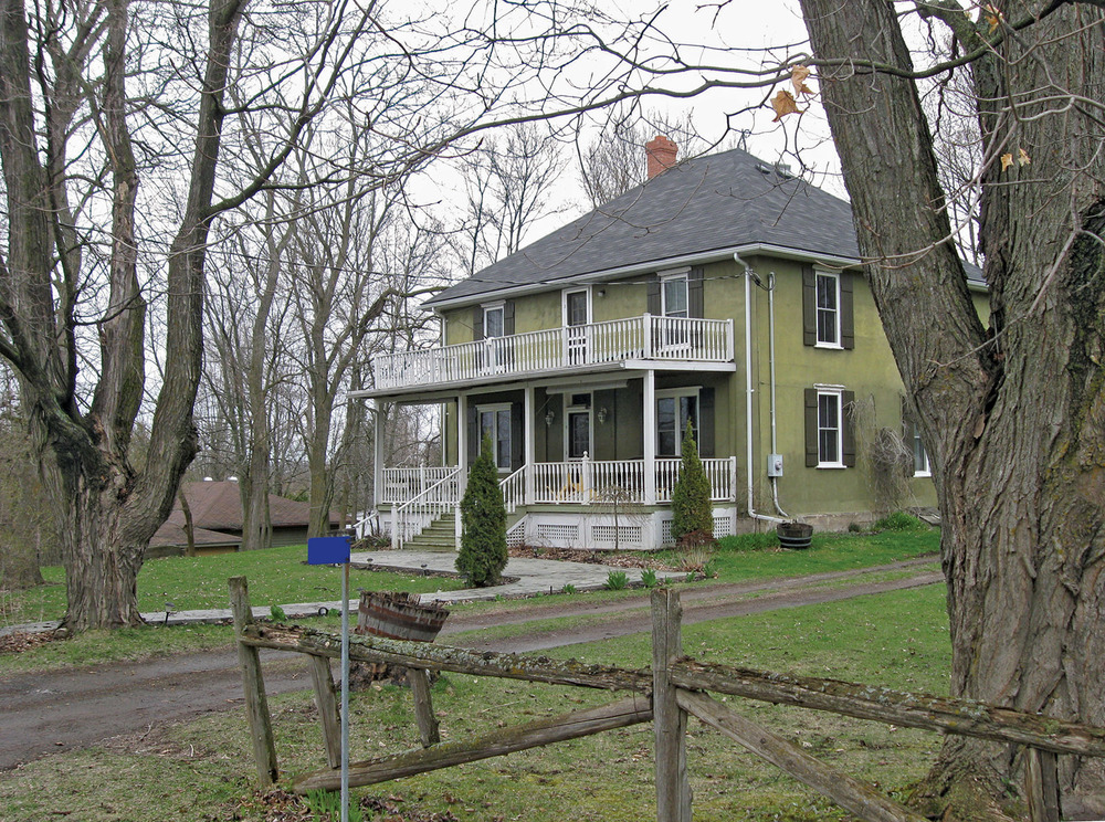 The dignified Bonter family farmhouse still stands above Crowe Lake.