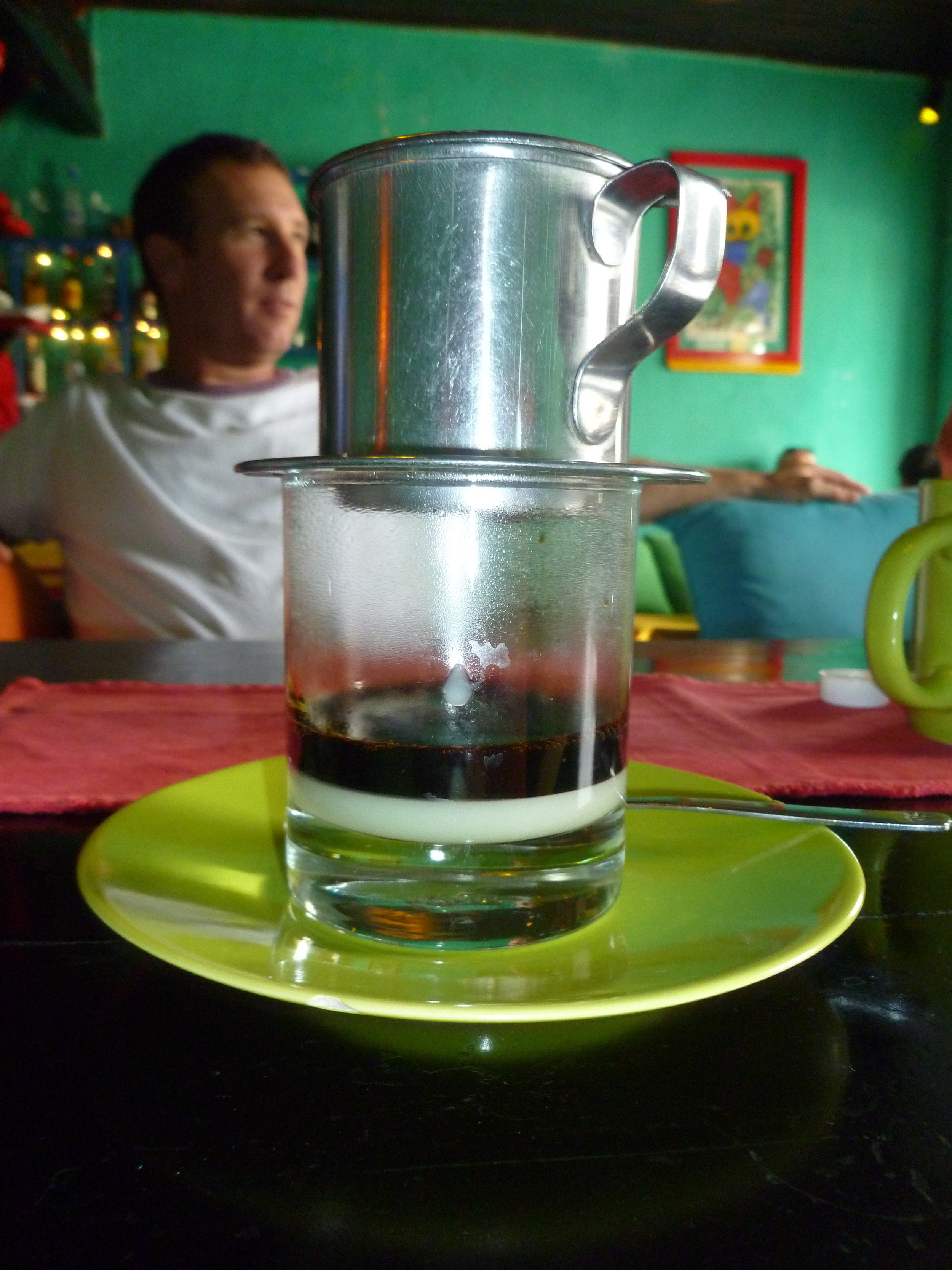 My Handsome husband enjoying a Vietnamese coffee in Hoi An, Vietnam