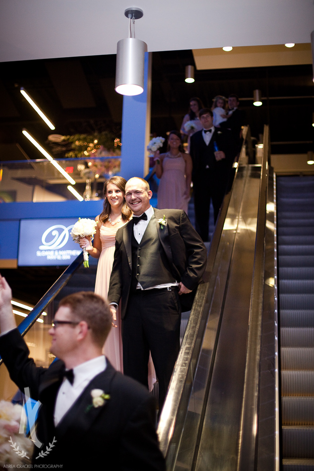 The wedding party was announced from the escalators.