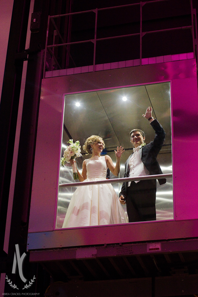 And the bride and groom made their grand entrance from the elevator! 