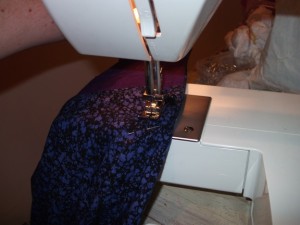 Taking in and hemming!
