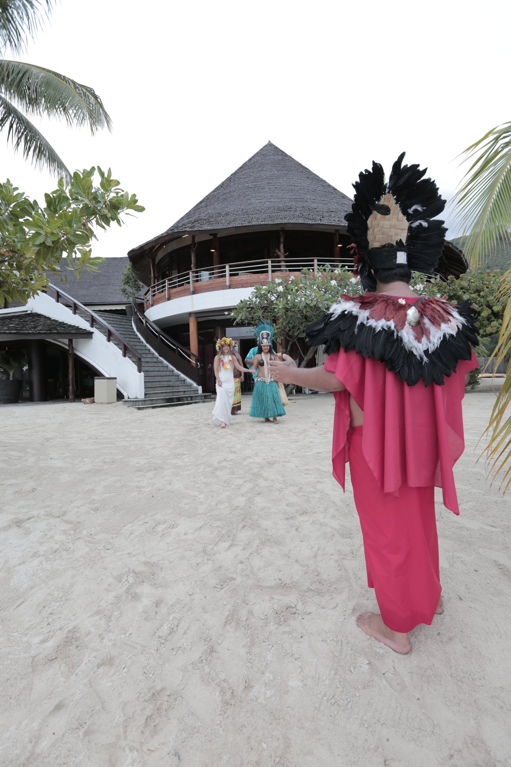The Tahitian priest welcomes me to the beach.