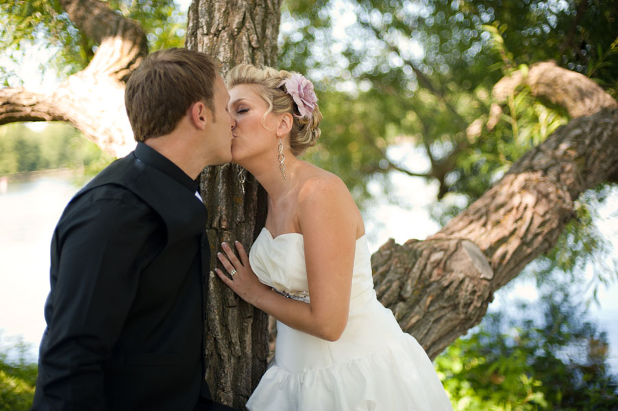 bride and groom kissing experimental farm