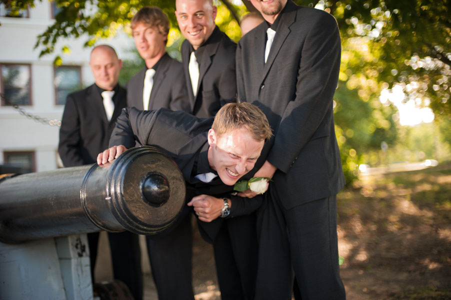 groom shot out of a canon wedding