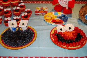 Cookie was carefully crafted with blueberries and blackberries with mini yogurts for eyes. Elmo was made with cherry tomatoes and olives and mini ranch dressing for eyes. 
