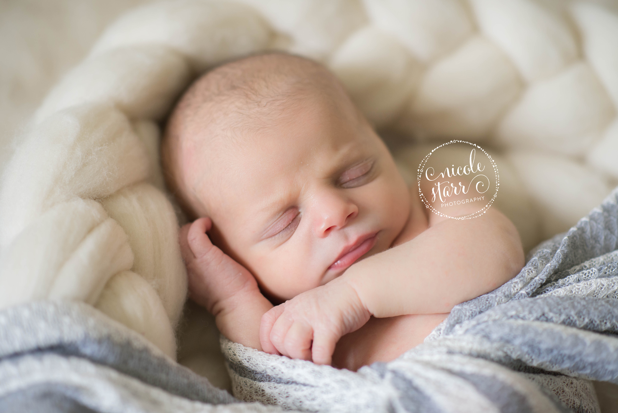 asleep newborn photo with soft color palette