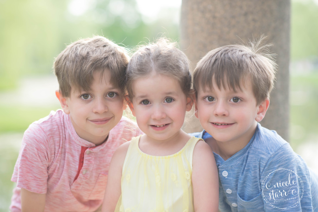 three siblings family photo