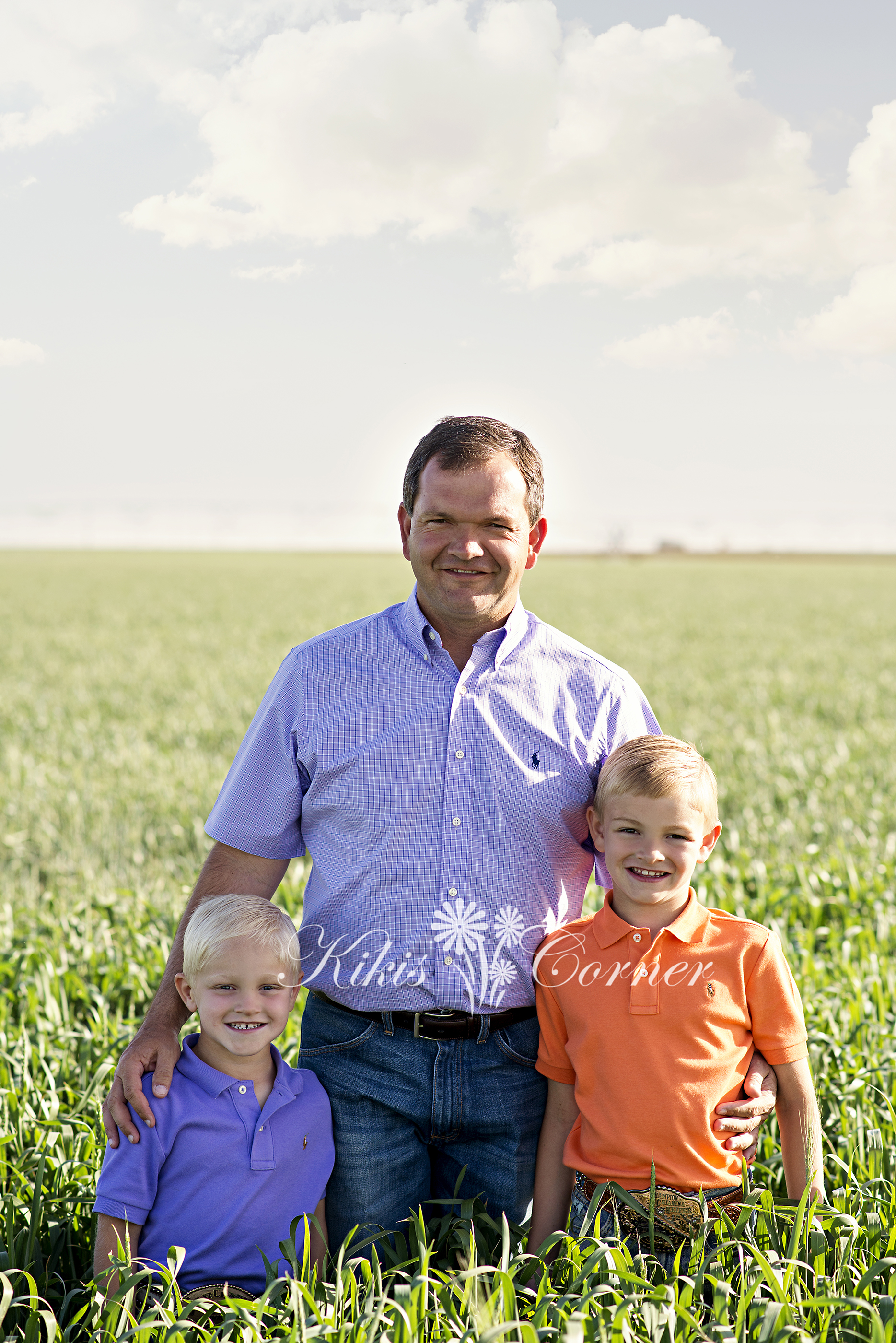 family in wheat field