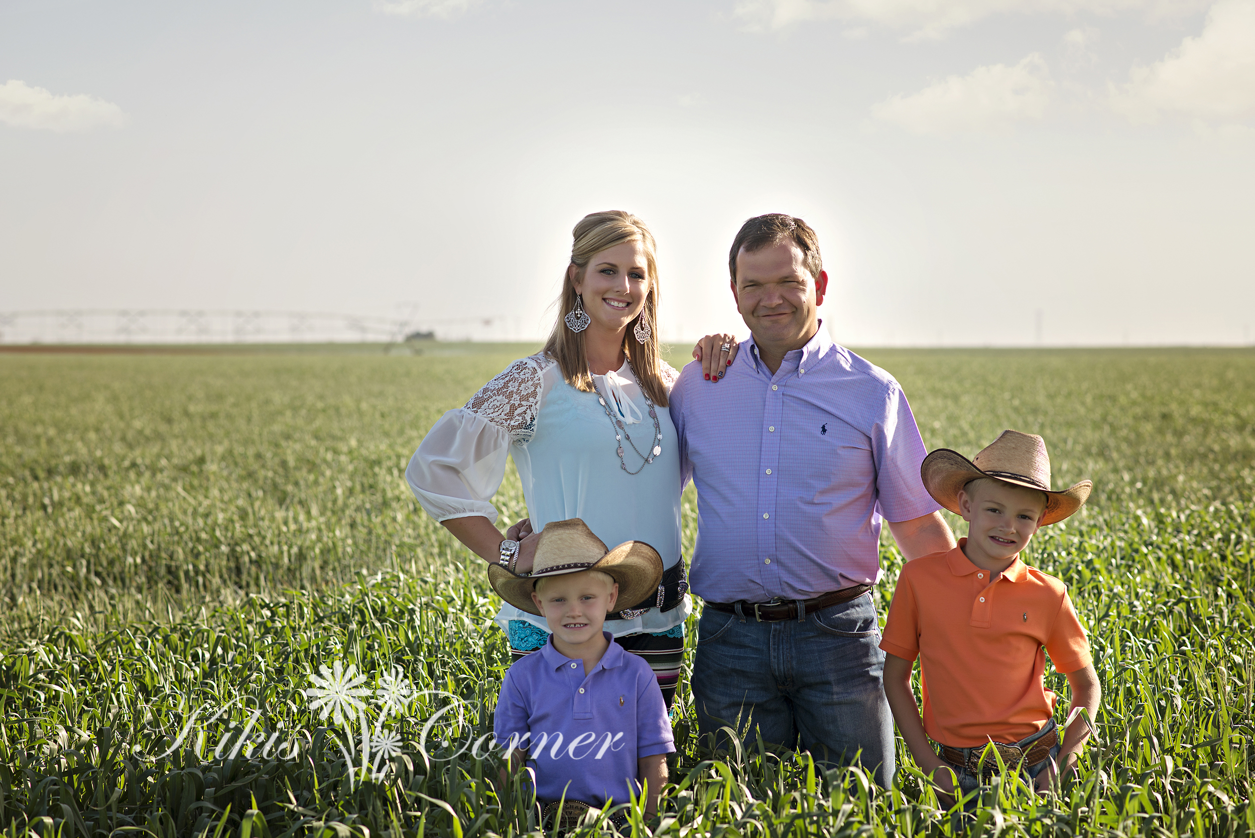 family in wheat field