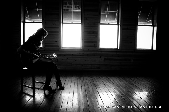 Meredith Fierke tunes her Les Paul during a photo session Feb. 16 at the Rueb 'N' Stein in Northfield, Minn.