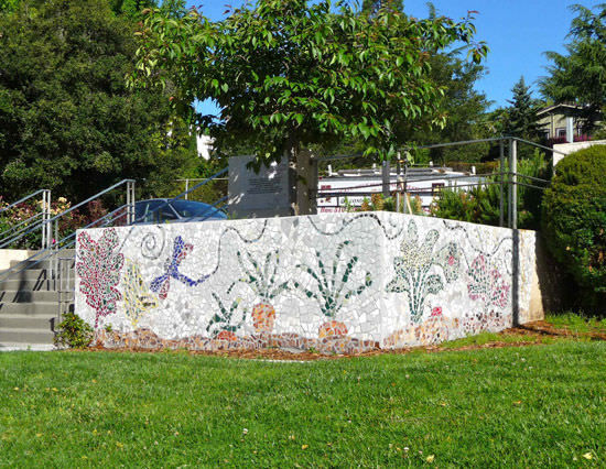Students, parents, neighbors and artists pitch in to create this gorgeous mosaic at Redwood Heights Elementary School.