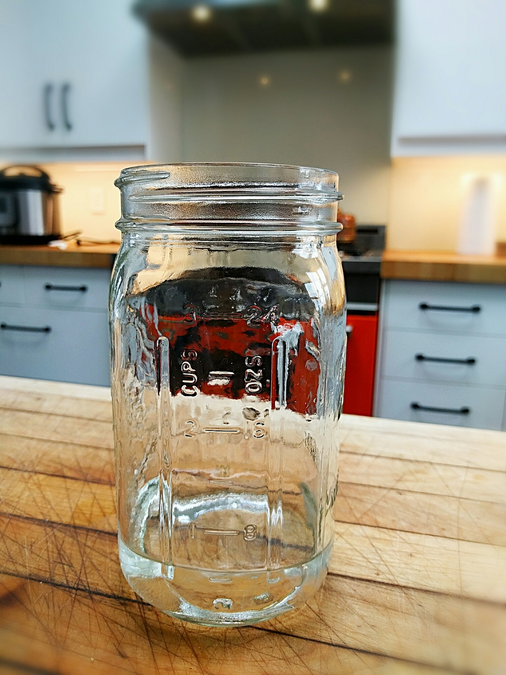 My water glass is a quart Mason jar. Four of these=one gallon.