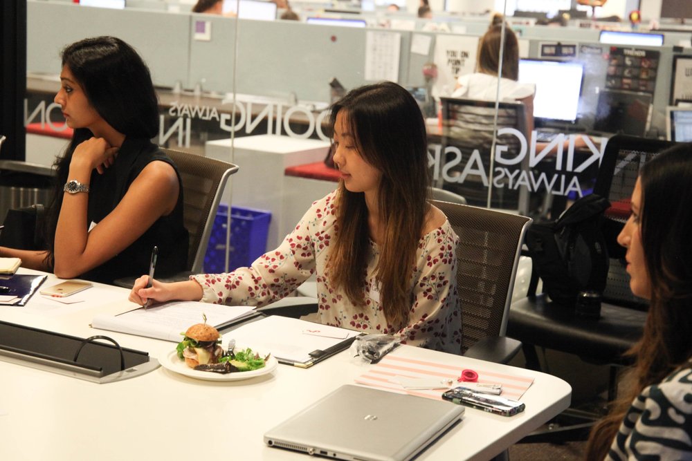  Junior Catherine Kang takes notes during her externship at omnicom MEdia Group in downtown Chicago. 