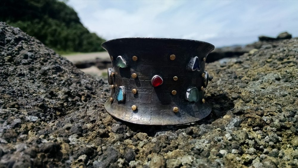  The cuff that started it all-made with sea glass (except for the red) purchased from Barbie. Photographed on the beaches where glass was found.    
