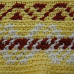 My Fair Isle swatch. I'm using scrap yarn for practice, so ignore the poor color choice!