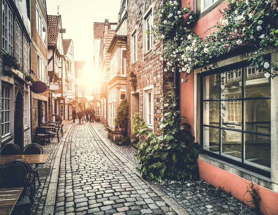 Historic street in Europe at sunset with retro vintage effect© JR Photography
