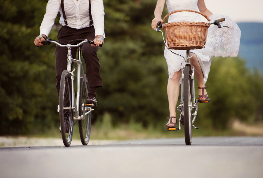 Bride and groom on the bikes