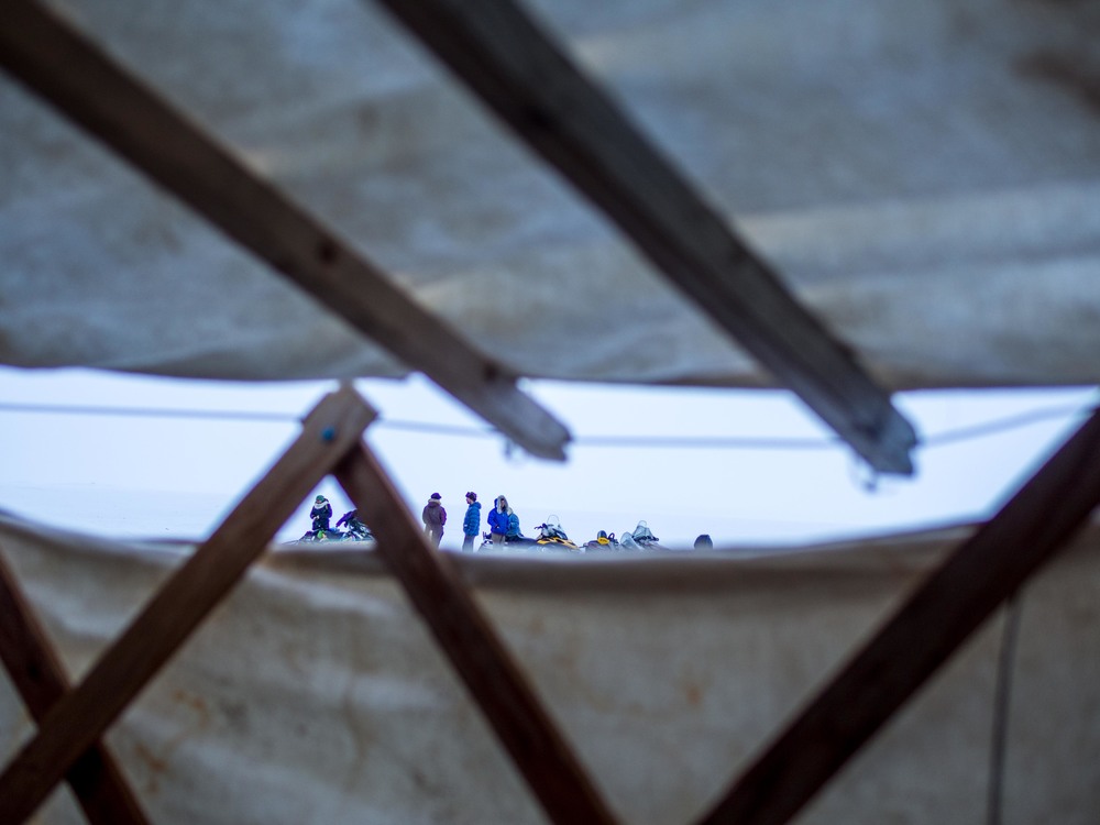 Peering out from the yurt to the brightness of the world north of 60. Photo by Anubha.