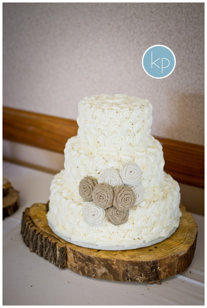 Wedding cake with burlap flowers