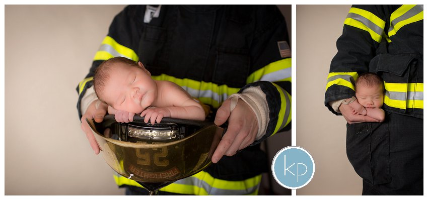 Baby in dad's fireman uniform, baby in pocket of fireman uniform