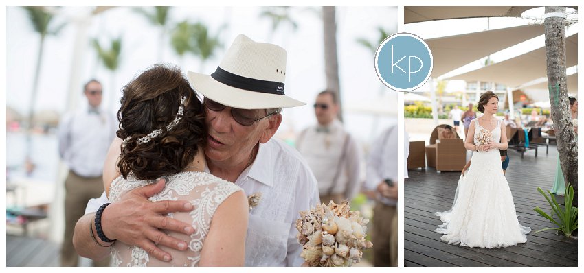 bride waiting to go down aisle, dad giving daughter kiss