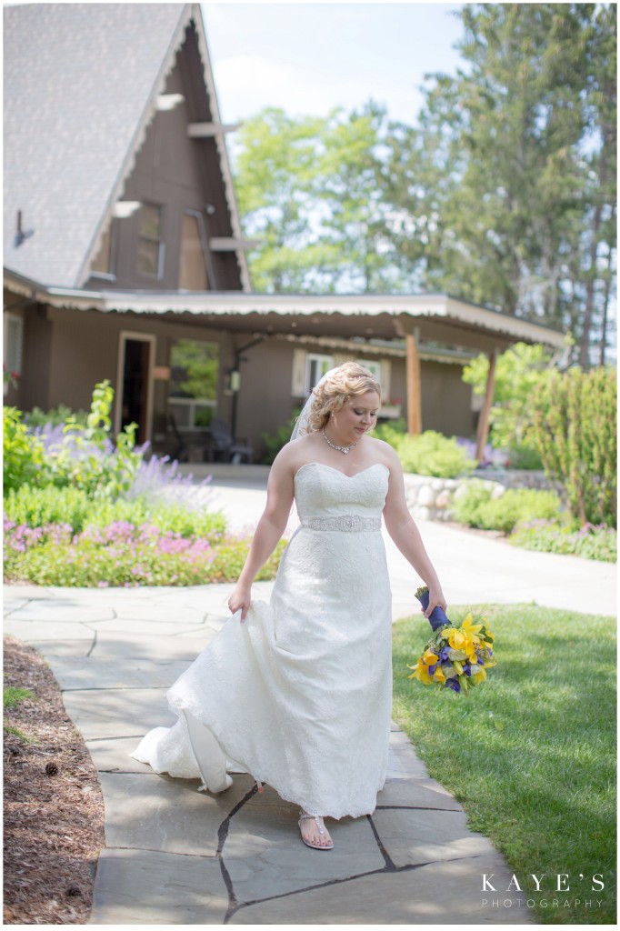 bride walking with bouquet