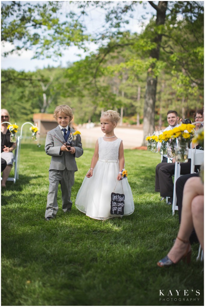 ring bearer with ring on fishing pole