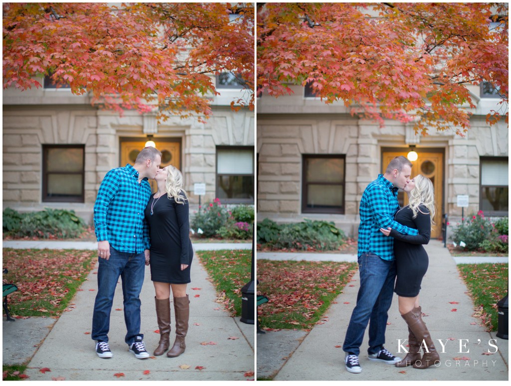 couple kissing under tree, fall leaves, hugging
