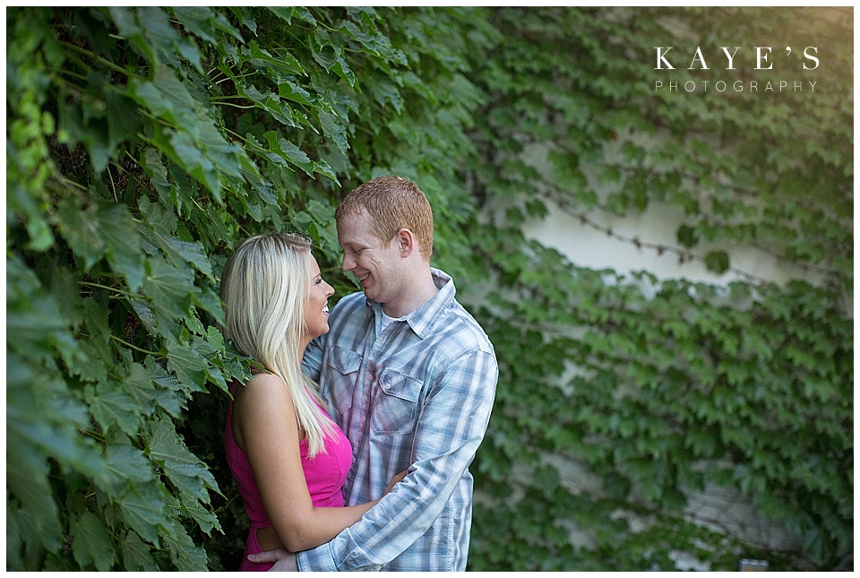 couple cuddling, couple with leaves, couple with ivy