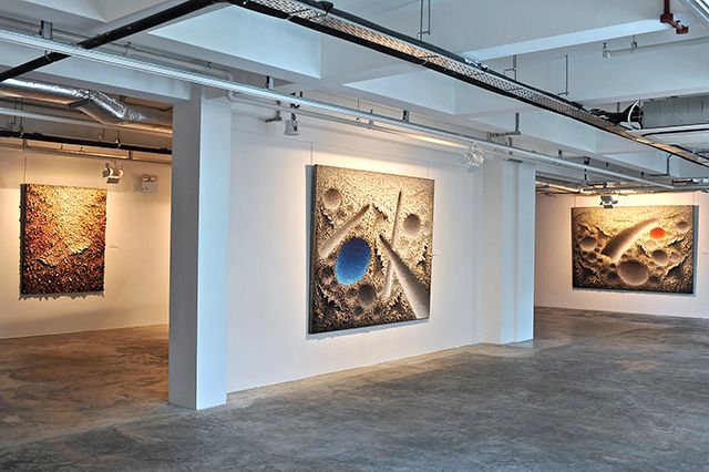 Chun Kwang Young's abstract textured paintings at Art Plural Gallery, courtesy of Art Plural Gallery