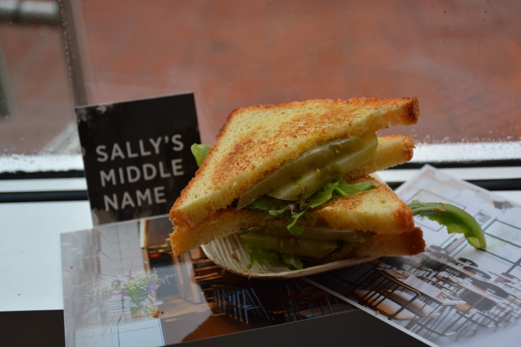 H St favorite, Sally's Middle Name, made these delicious BLTs with Pickled Green Tomatoes from Earth N Eats Farm, organic bacon cured at Sally's for a month, spicy house-made mayonnaise and pullman loaf. (Photo by Raisa Aziz)