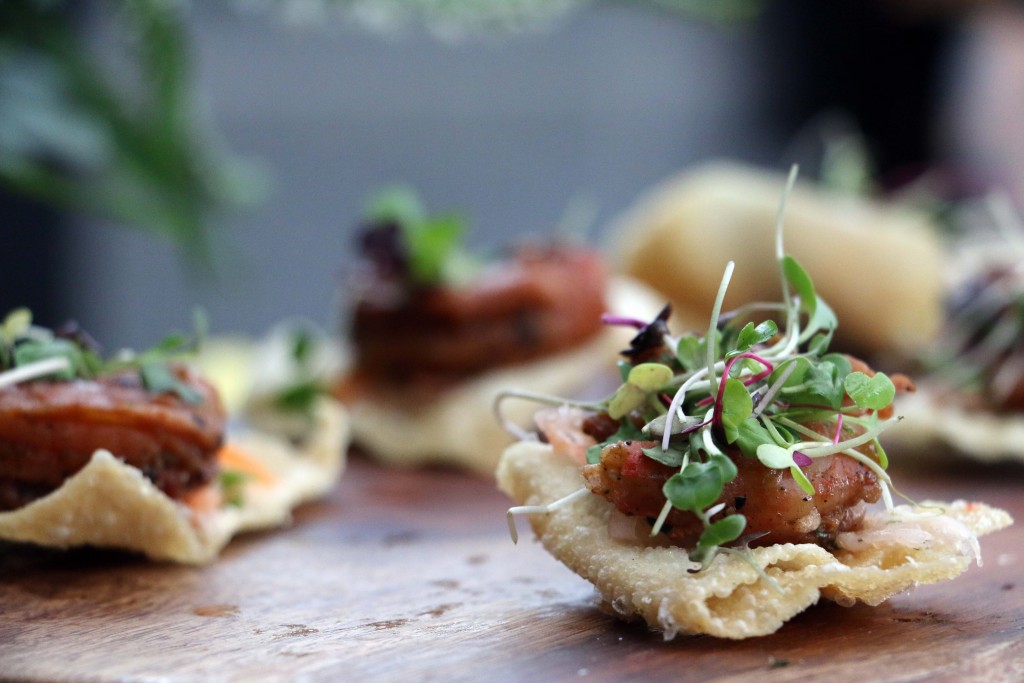 These white sesame shrimp with daikon carrot slaw on a crisp wonton were paired with locally inspired punches at the Columbia Room patio. (Photo by January Jai)