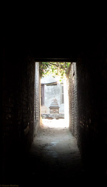 small stupa at the end of an alley