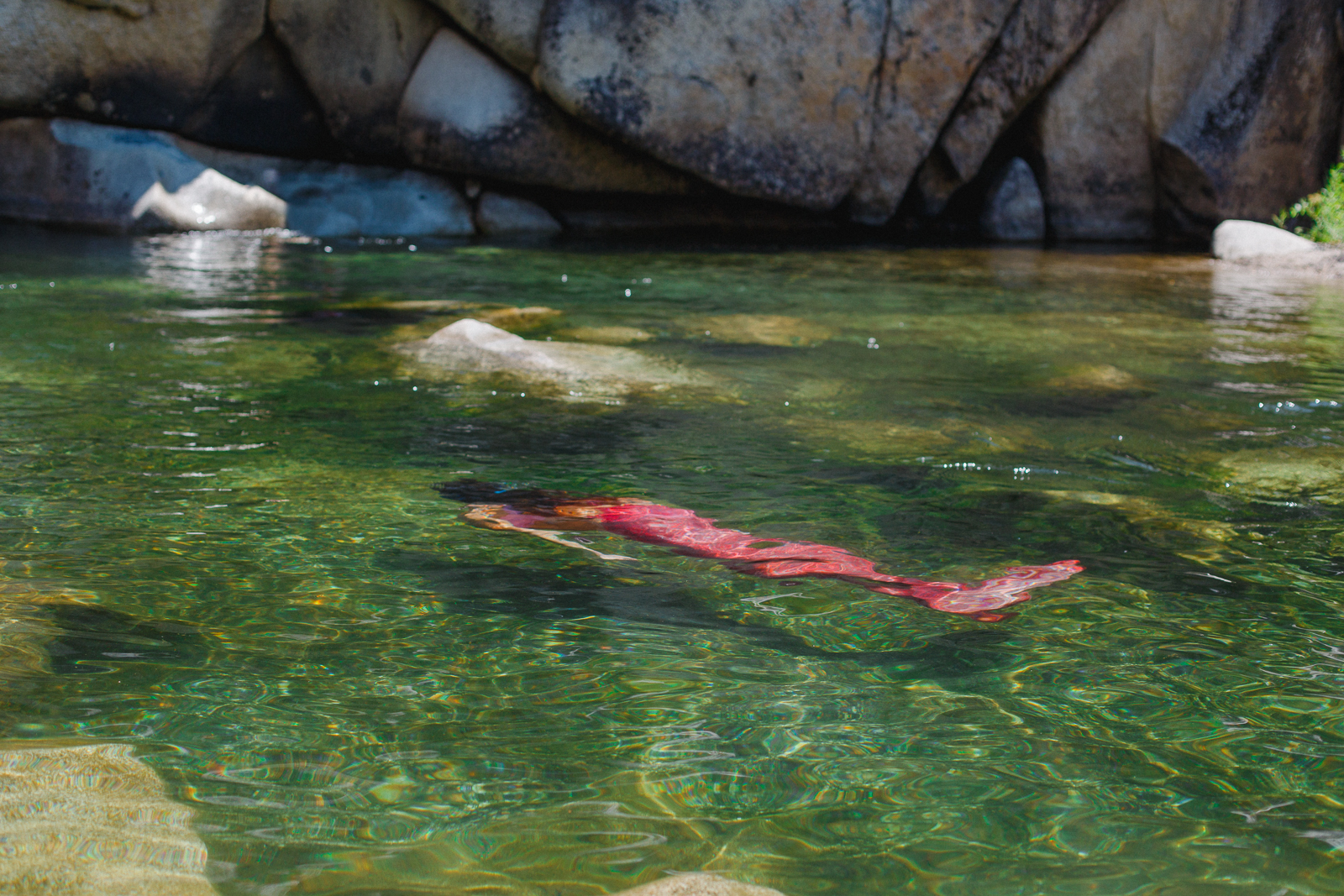 Mermaid underwater in the Yuba River outside Nevada City, California