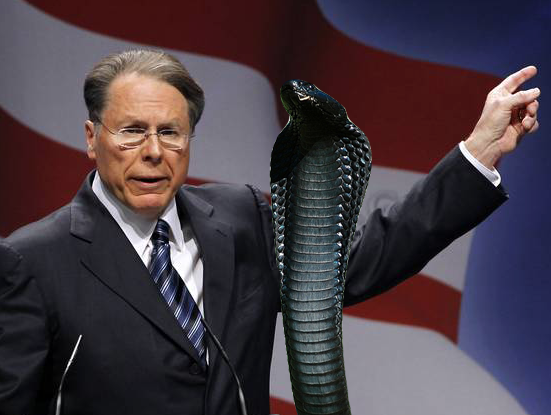 LaPierre embraces a King Cobra as he outlines his plan to surround children with deadly serpents.