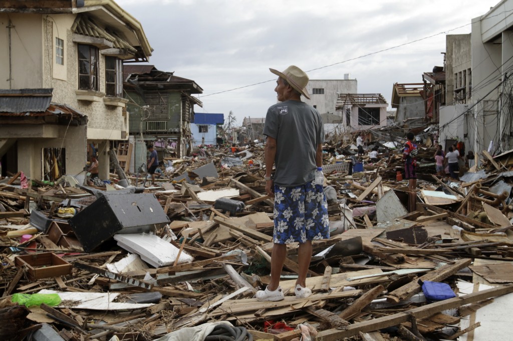 A man assessing the damage in Tacloban.