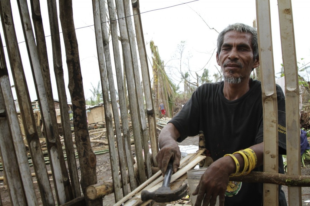 A blind carpenter who was rebuilding his own home after  Super Typhoon Yolanda.