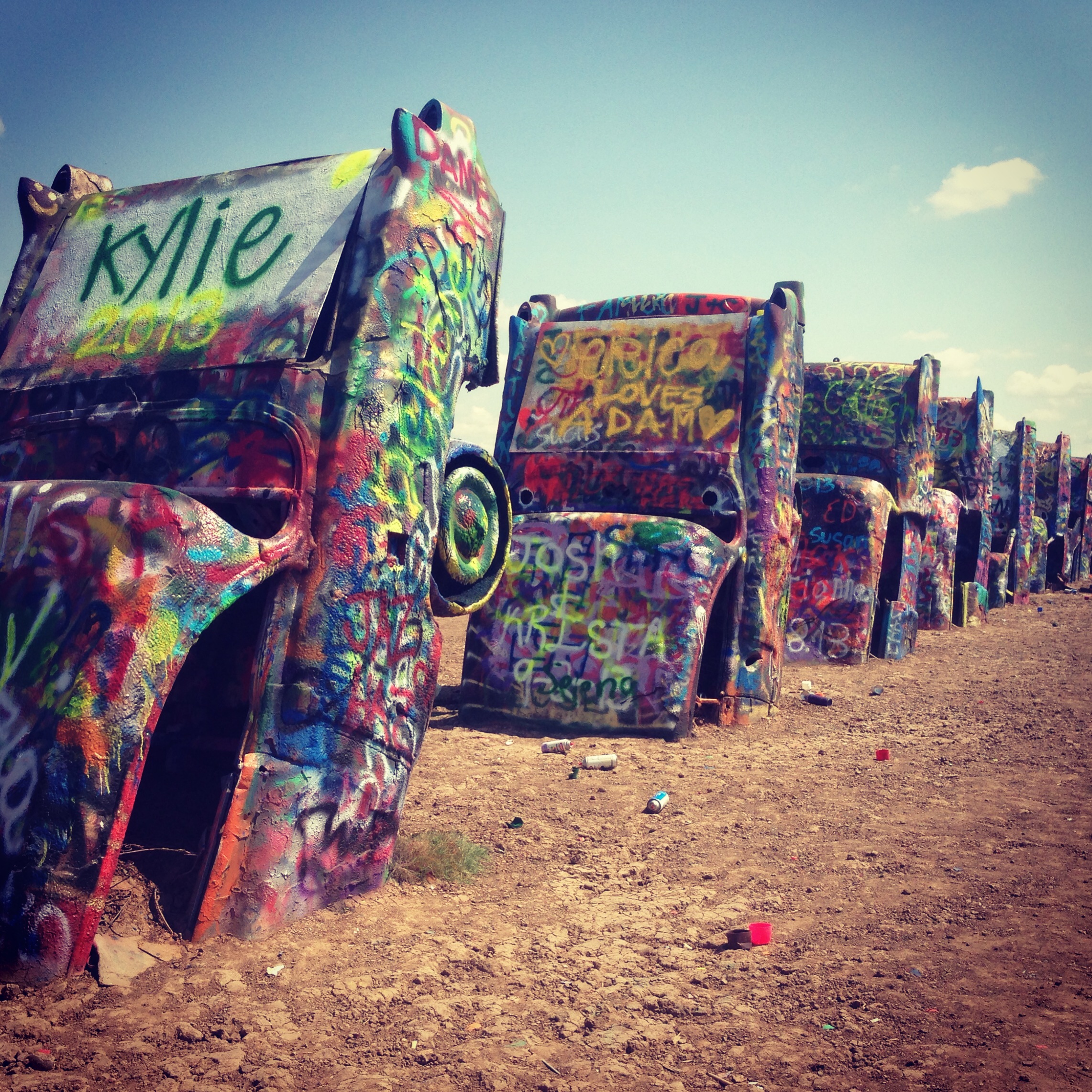 After driving back and forth across the country 5 times, we finally stopped at the Cadillac Ranch in Amarillo, Texas