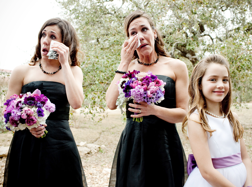 crying bridesmaids and smiling flower girl