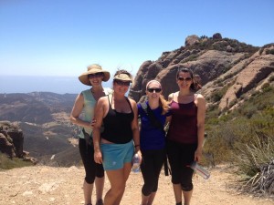 "This is a photo of four of us who met through GirlFriendCirlces who joined a group of others to hike in Malibu together, followed by lunch at Neptune's Net. The hike was really challenging--I think it was about 7 miles--but we pushed through and finished!"