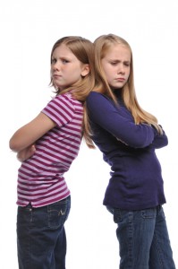 two young girls in a fight