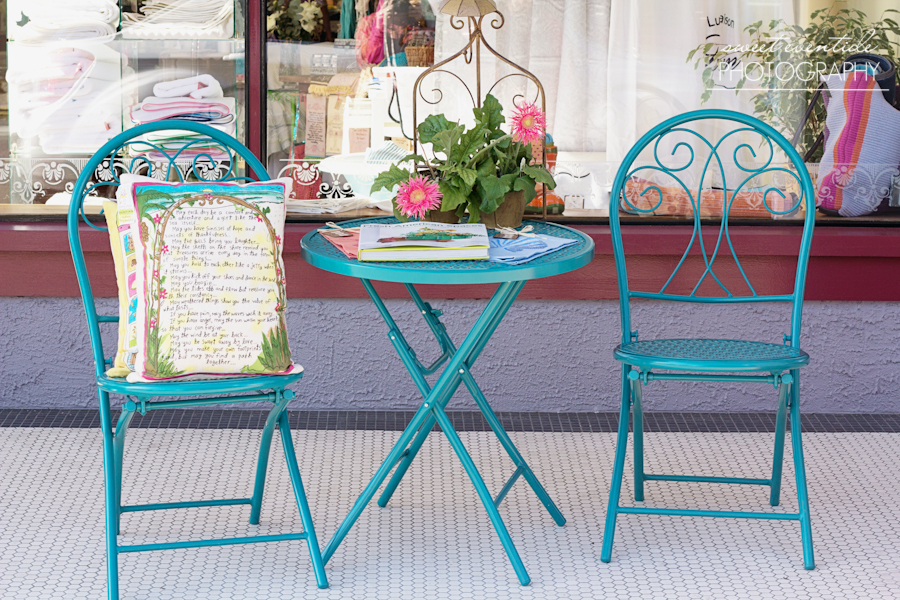 turquoise metal patio table two chairs retail styling astoria oregon