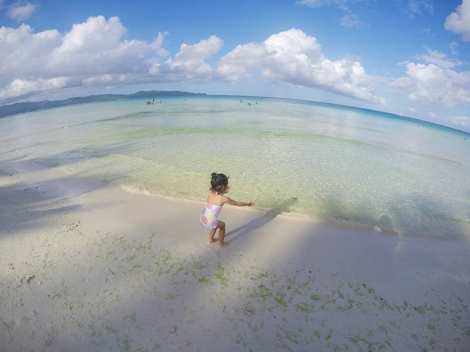 Boracay 2016 Part 2 family white sand beach palm trees blue sky toddler